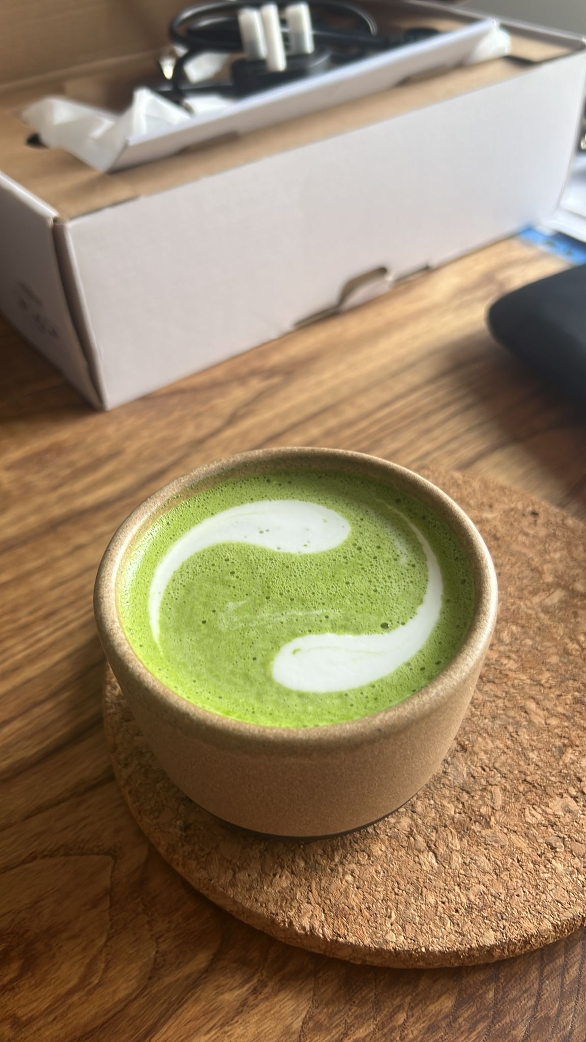 Matcha yin-yang art in a bowl